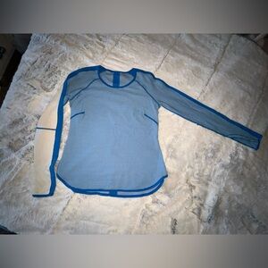 Long sleeve lululemon shirt. Blue and white stripes. Reversible.